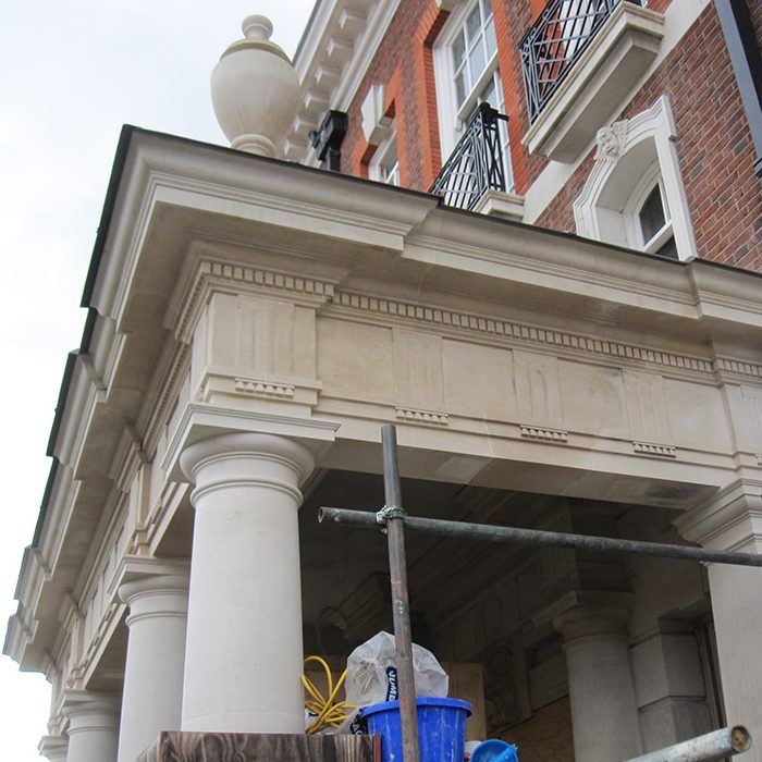 Doric entablature with triglyphs, guttae and dentils