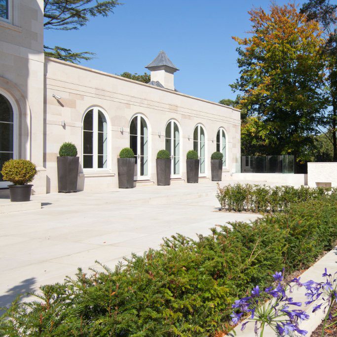 Limestone ashlar. Sandstone paving